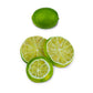 3 freeze-dried lime slices beside whole regular lime